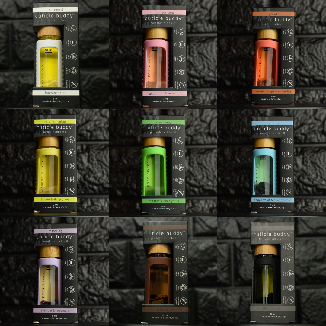 a collage of 9 different cuticle buddies in silicone holders in their packaging boxes on a black brick background