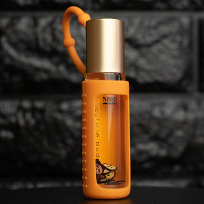 Orange bottle with gold cap on a dark background