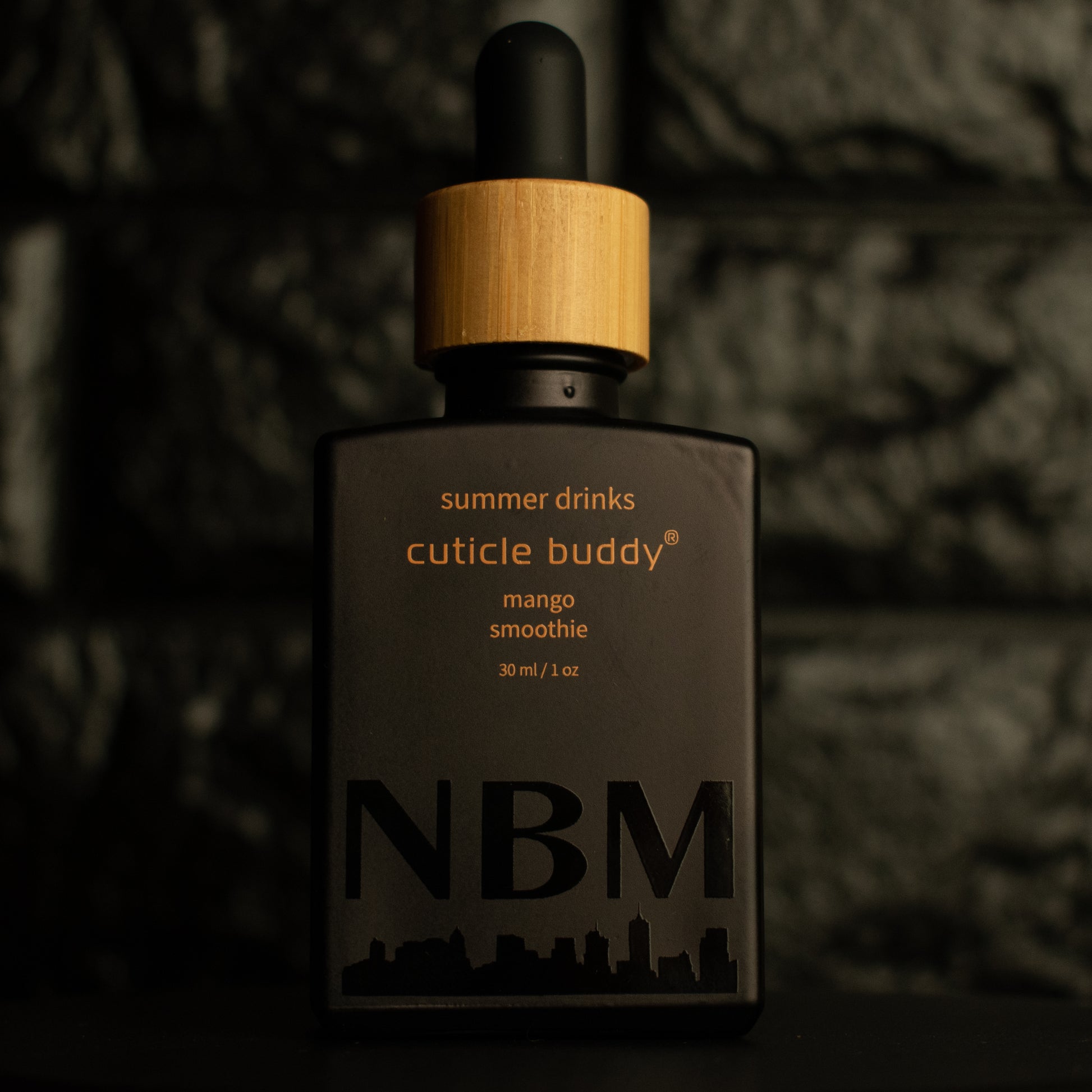 one ounce dropper bottle in the scent mango smoothie